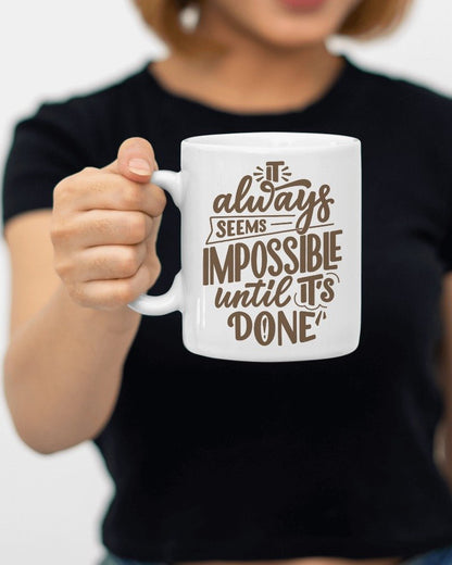 It Always Seems Possible Until It's Done" Coffee Mug